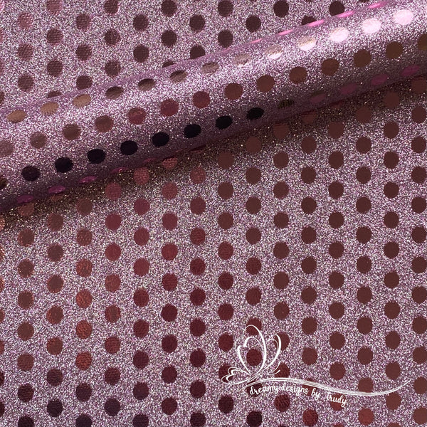 Holographic Spots on Pink Fabric